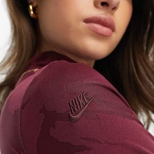 Nike bodysuit small
